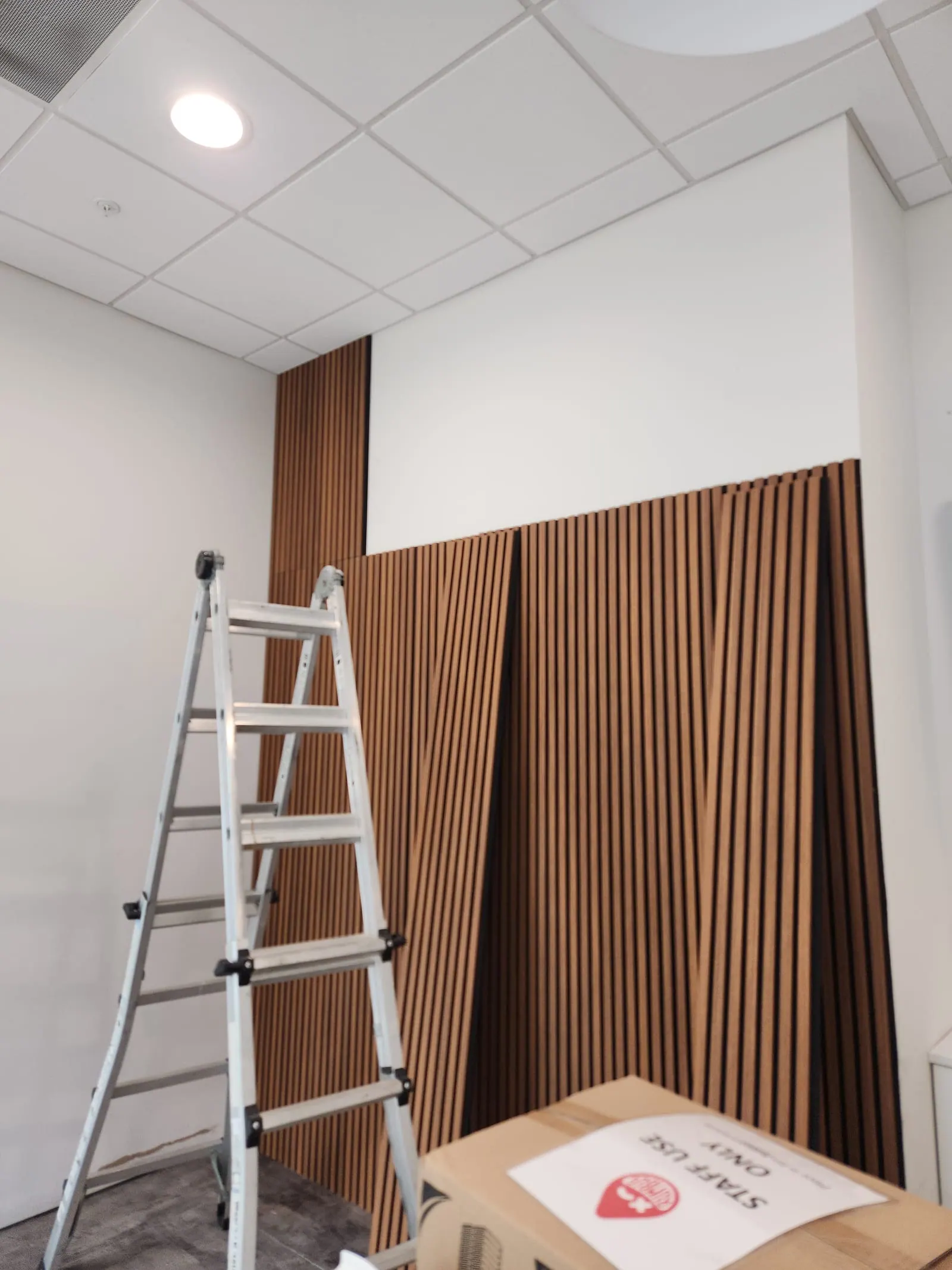 Wood accent wall during PalmPro installation