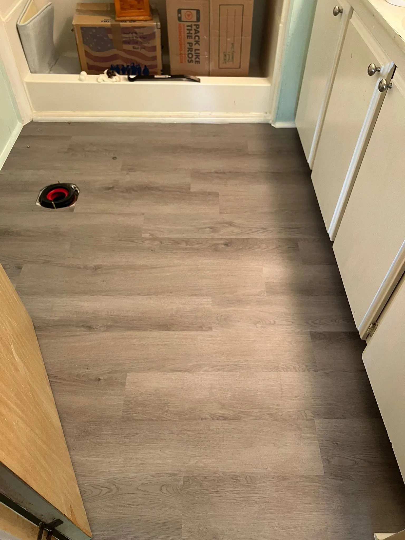 Completed PalmPro bathroom laminate flooring project